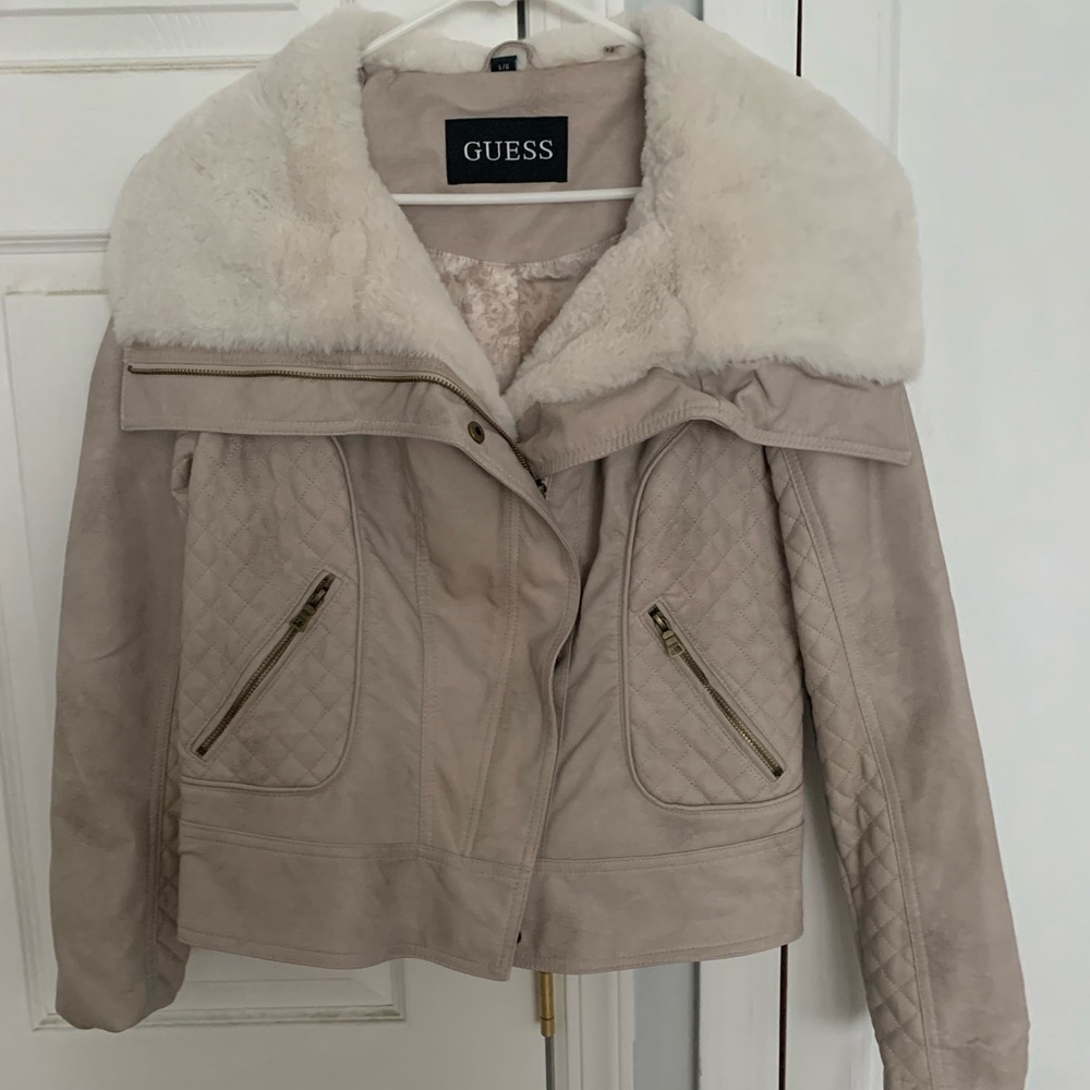 Brand new Guess leather jacket worth faux fur collar. Original price $180. Large
